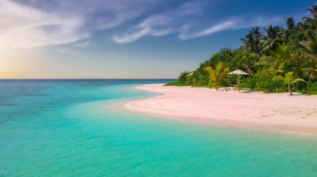 Tropical beach with white sand and turquoise blue water